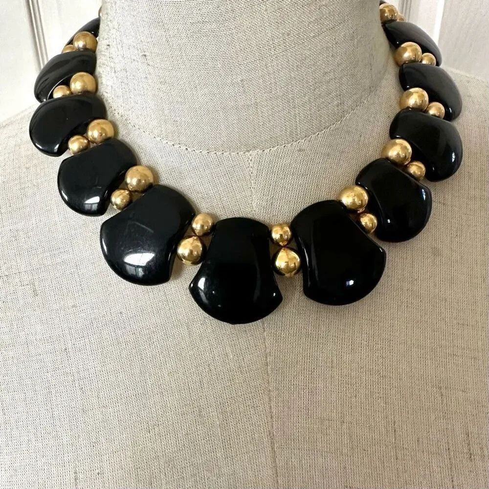 Black and gold tone statement necklace